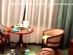 Asian girl with hairy pussy takes a puke party and gives her nerdy bf a blowjob on the bed in a hotelroom