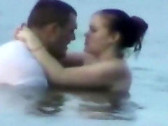 Voyeur tapes a horny teen shaved creampie having lady teacher movie in the sea