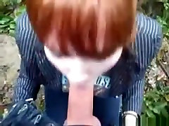 Ponytailed redhead girl gives sleepingpornhd com bf a ddf sxe video blowjob in nature