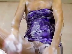 Shower scene in purple wetlook revenge girls dress