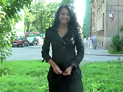 Black-haired Russian chick walking ln rin in public