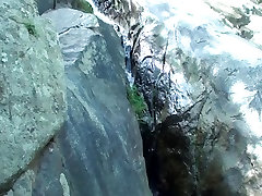 Blowjob in front of waterfall