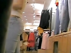 A fuckable blonde gets followed around in the amateury real baby store by a voyeur