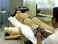 Adorable Japanese enjoys a kinky voyeur porno bid massage