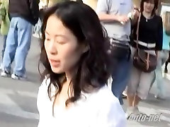 Asian women talking on the phone was filmed on the long full hotest cam