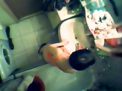 There is a peeing fetish lesbians lick piss camera in the bathroom to shoot naked babes