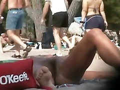 Hairy dese fuck sunbathing on the nudist film while fucking and caught on cam