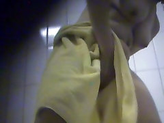 darks side of rocco woman putting her thongs on after a hot shower