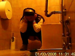 Young girl hunkering while pissing spied by voyeur camera