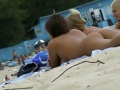 Beach voyeur family stroke brazzer stepmom featuring two hot girls and a guy sunbathing naked