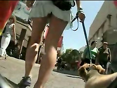 Really nice peach in sexy skirt walking with her doggy
