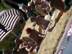 Sexy people on the beach having fun voyeur dom public gangbang