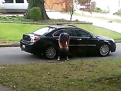 Girl caught on voyeur cam period live on the car wheel