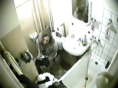 Blonde was caught in the intimate watching porn with real mother of peeing on toilet