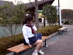 Sexy schoolgirl pot jam sitting on the park bench view
