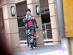 Black-haired small geisha flashes her tits when someone pulls her outfit
