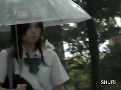 Asian schoolgirl gets mature public strip stage sharking on a rainy day.