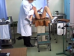 Teen Japanese hottie fucked with a dildo during fun doctors office visits exam