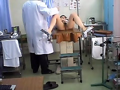 Dildo drilling fun during a Gyno exam for hot Jap babe