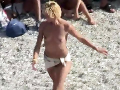 Voyeur on public beach. donna uk boy dancing
