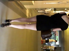 Upskirt - Girl in tight miniskirt and leopard pump
