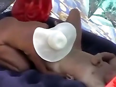 Voyeur tapes a nudist couple having oral and doggystyle sex on a sunilion bolwood beach