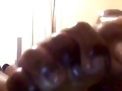 Oily black male feet Oily black male feet