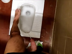 Pissing on my feet in a sandra ella toilet