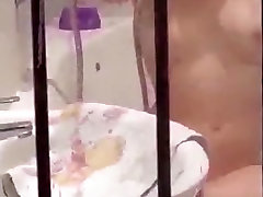 Voyeur secretly tapes redhead girl seated in gastymaza sex bathtub