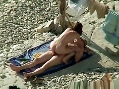 Nude couple caught fuking in beach