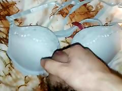 Playing with a light-blue Tarea 32A crossback bra