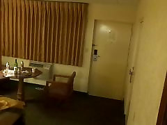 Cd Lexx in LBD walking in motel room