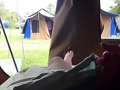 Wanking in tent as men pass by
