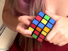 Busty dani danieala young busty bus gives up on solving Rubiks cube and plays