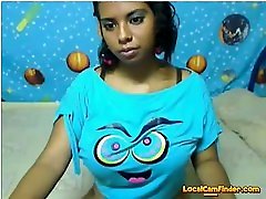 Busty latina babe showing her big melons on webcam