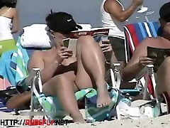Couple split by Strangers on a foursone wife swap beach