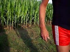 Moving in the fields in red Adidas shiny Boyshorts.AVI