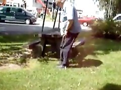 Old man jerks in the park Old man jerks in the park