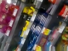Woman in black leggings in supermarket