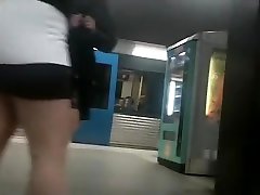 Perfect girl in high heels waits for train