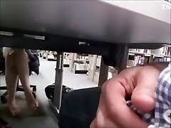 Horny office clerk jerks off under the table