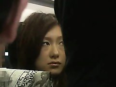 Businessgirl girl guroop by Stranger in a crowded train