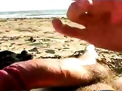 Big titty blowjob on the beach