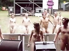 Young nudists pose for work mates and dance