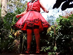 Sissy Ray in Red Taffeta Dress on Windy Day