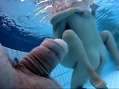 Naked punk latina oil anal underwater at a nudist resort pool