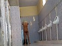 Indian male stripping nude in public restroom Indian male stripping nude in public restroom