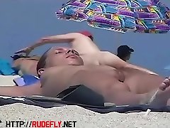 Two hot candid beach babes naked in the sun 2