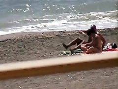 veyour batgroom hot ass brunette gives blowjob and hand job on the beach