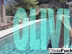 Horny Olivia Austin plays with her pussy underwater